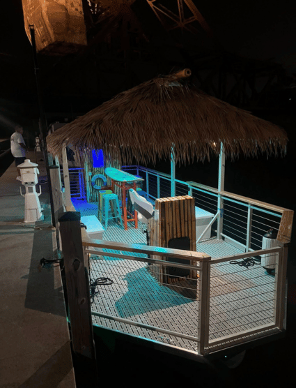 Mad Beach Tiki Boat at night