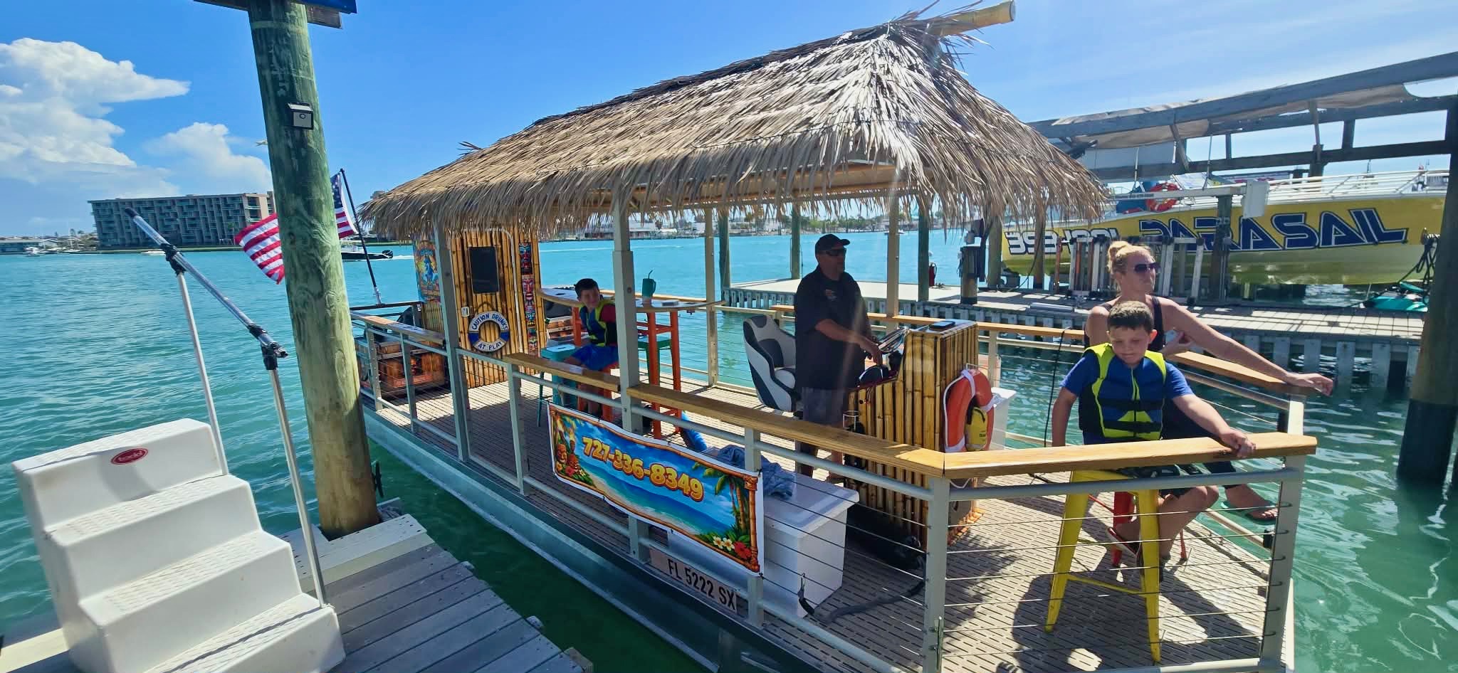 Night tiki cruise with colorful guests